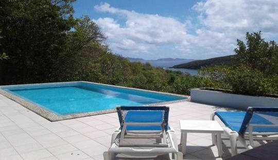 view of sea from pool deck